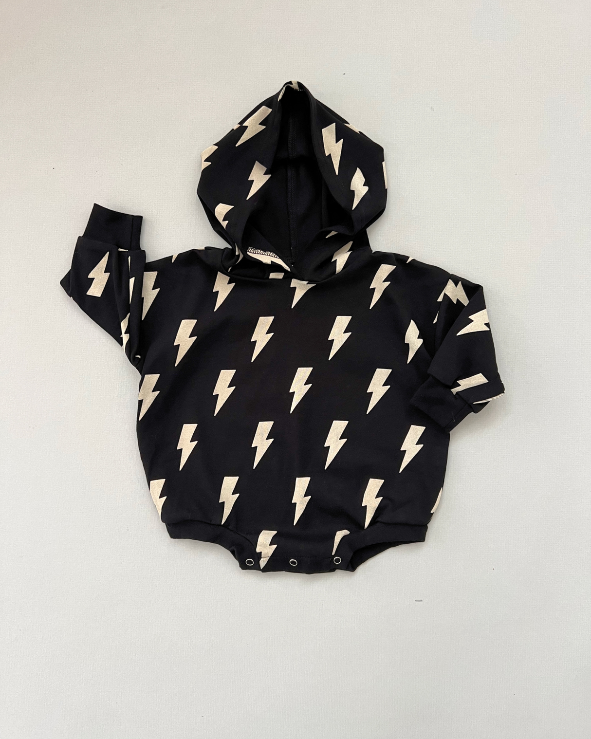 Hooded Bubble Romper | Black Bolts - HoneyBug