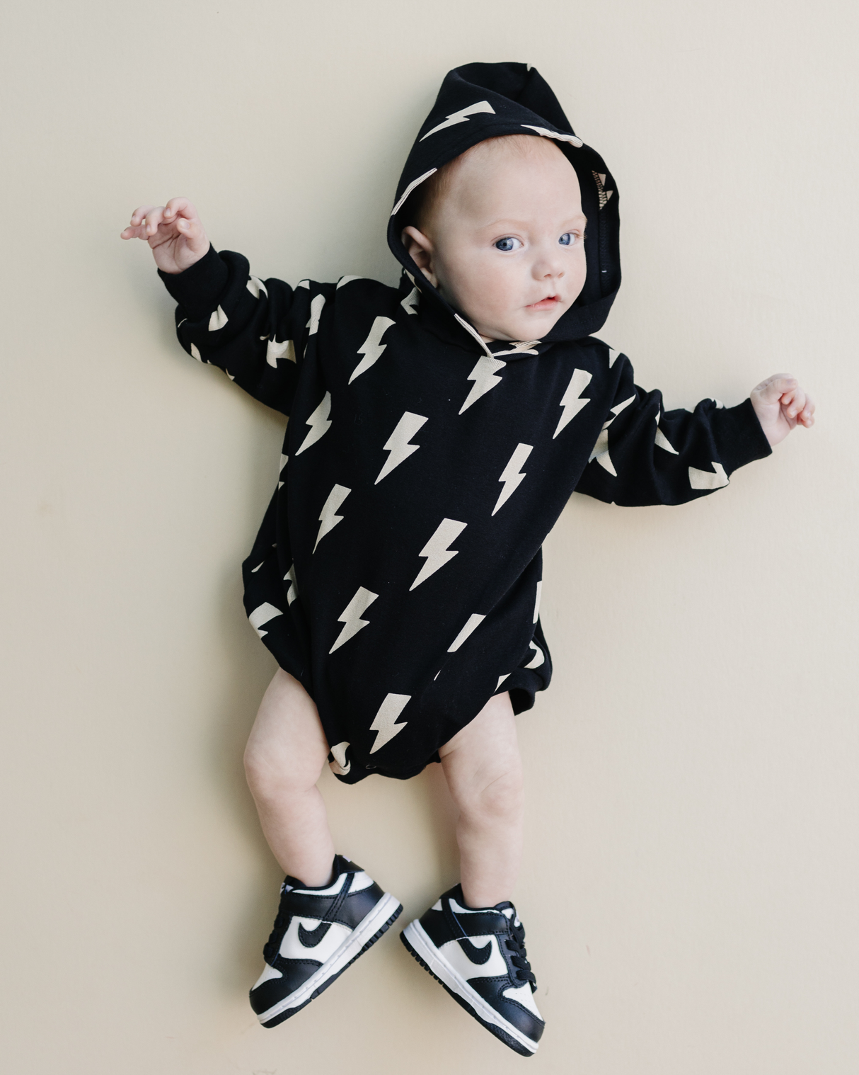 Hooded Bubble Romper | Black Bolts - HoneyBug