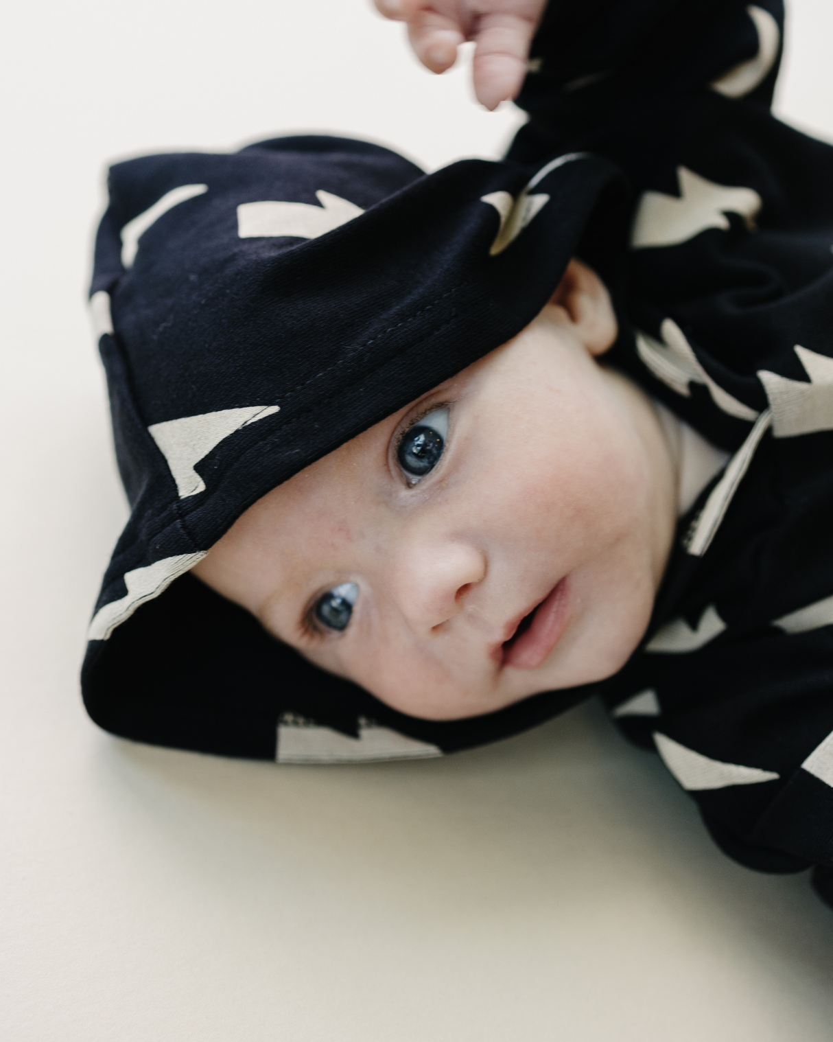 Hooded Bubble Romper | Black Bolts - HoneyBug