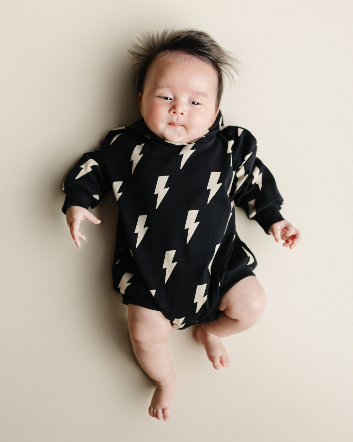 Hooded Bubble Romper | Black Bolts - HoneyBug