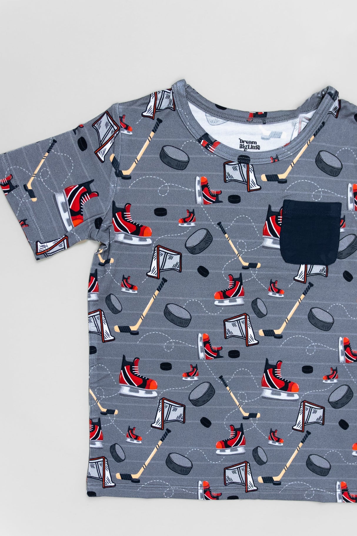 AT THE RINK DREAM POCKET TEE - HoneyBug