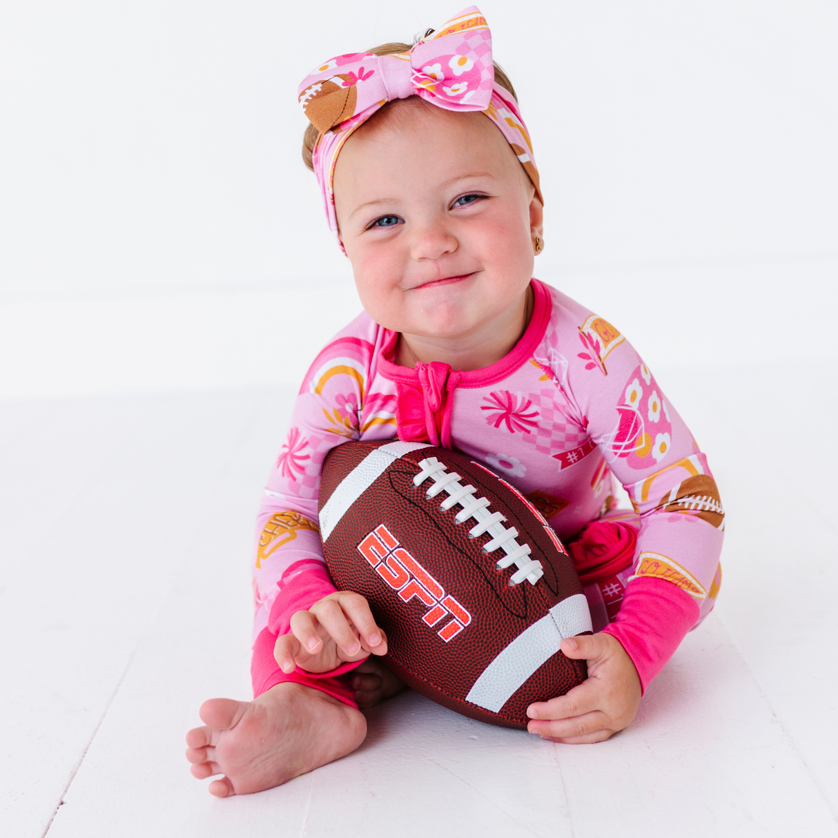 On Game Days We Wear Pink Convertible Footies with Ruffle